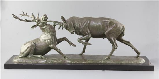 Irénée Rochard (1906-1984). A French Art Deco bronzed spelter group of two fighting stags, 29.5in.